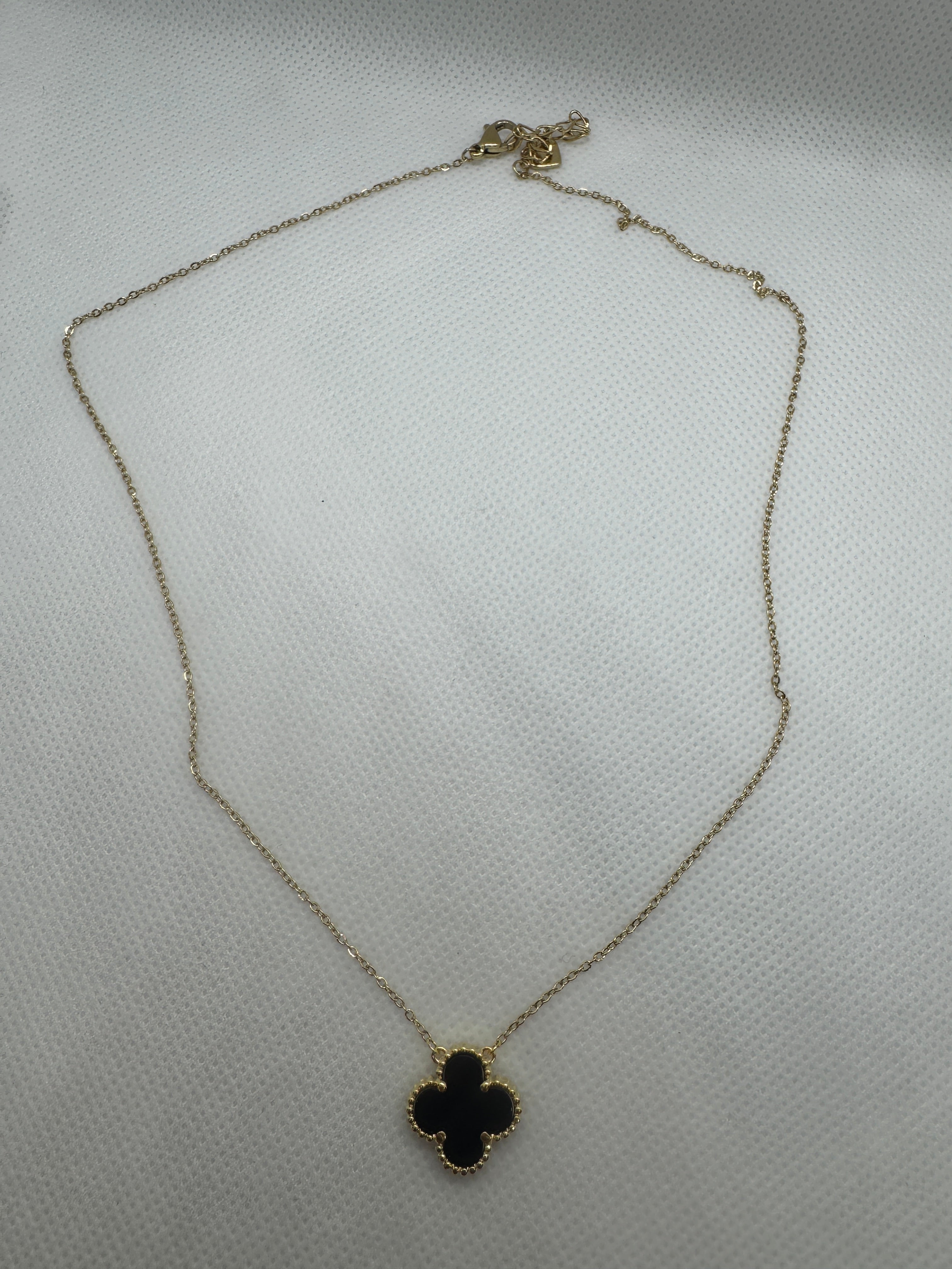 Collana con fiorellino nero oro