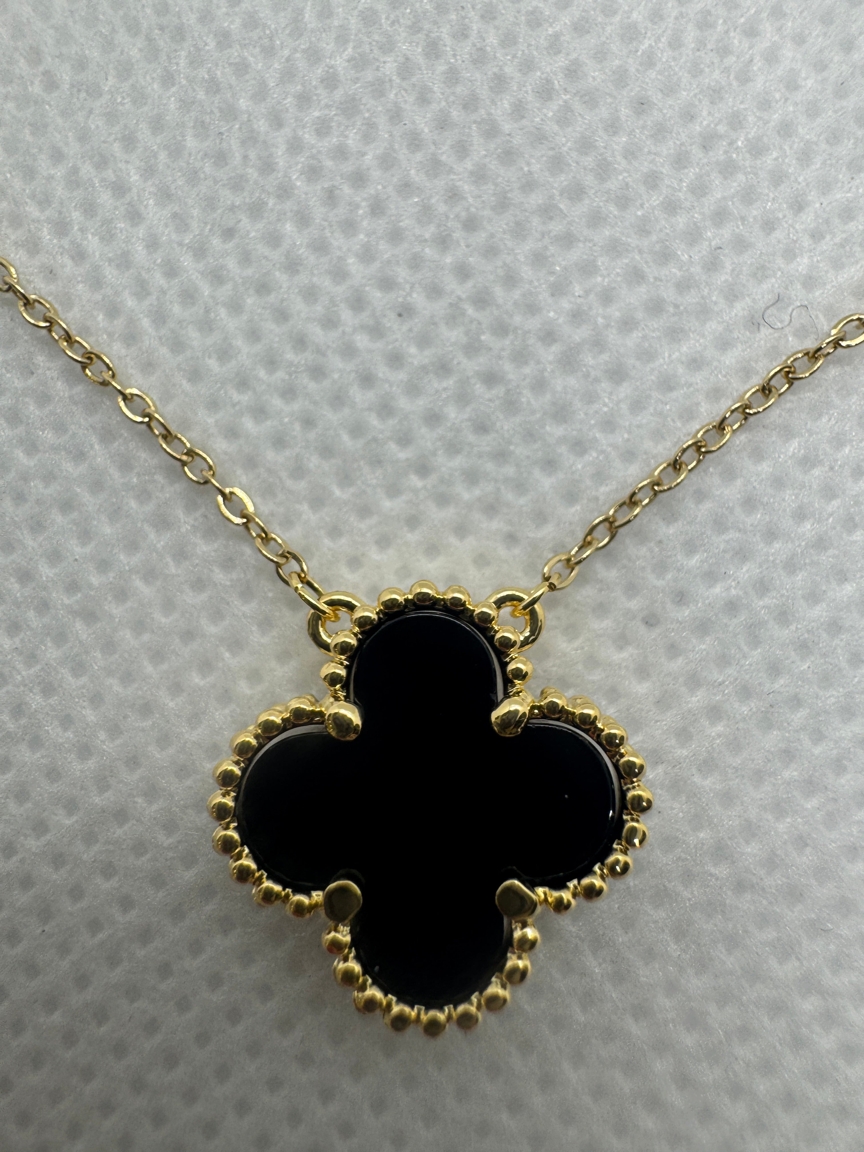 Collana con fiorellino nero oro