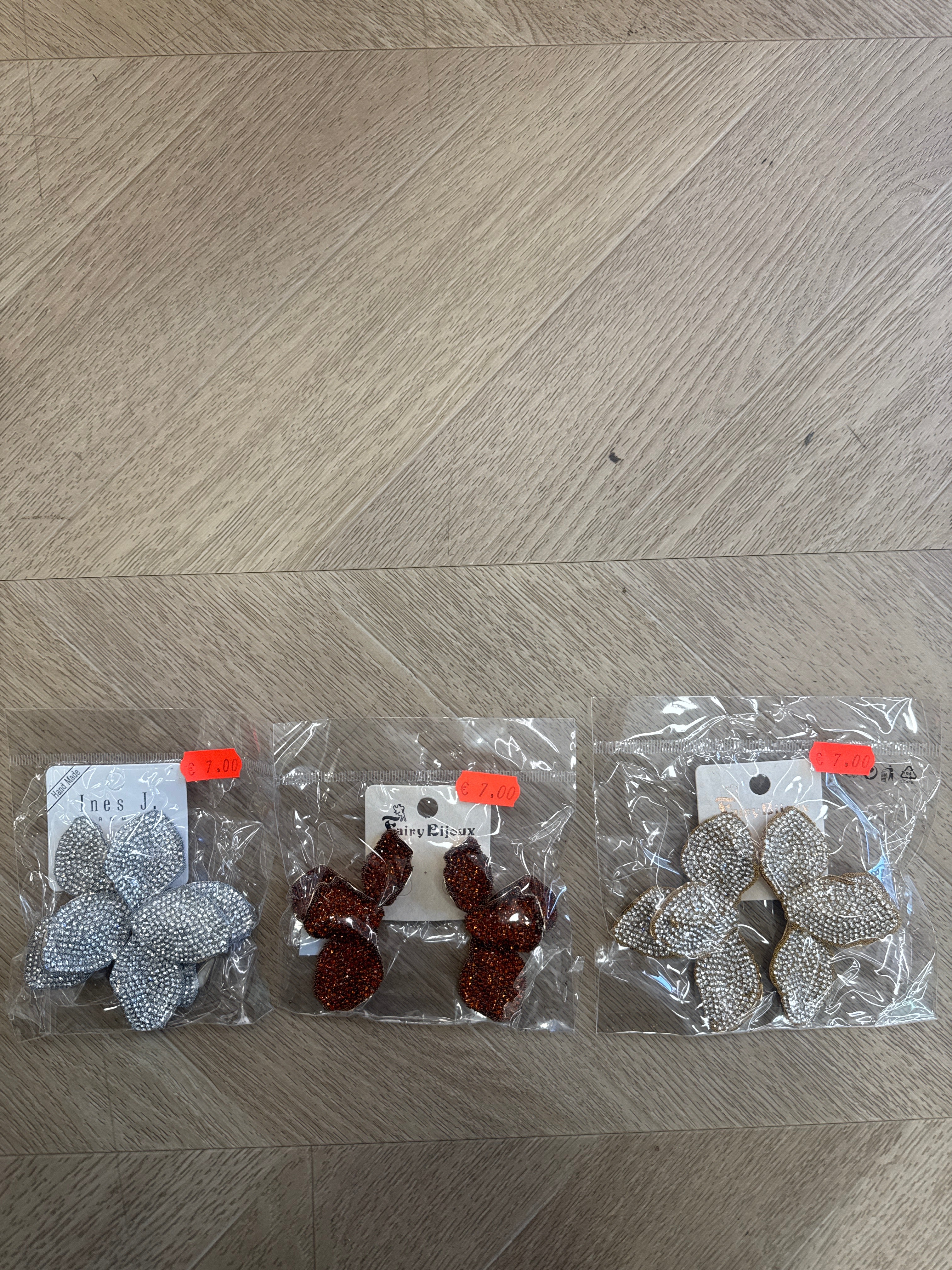 Orecchini mezzo fiore brillantinato