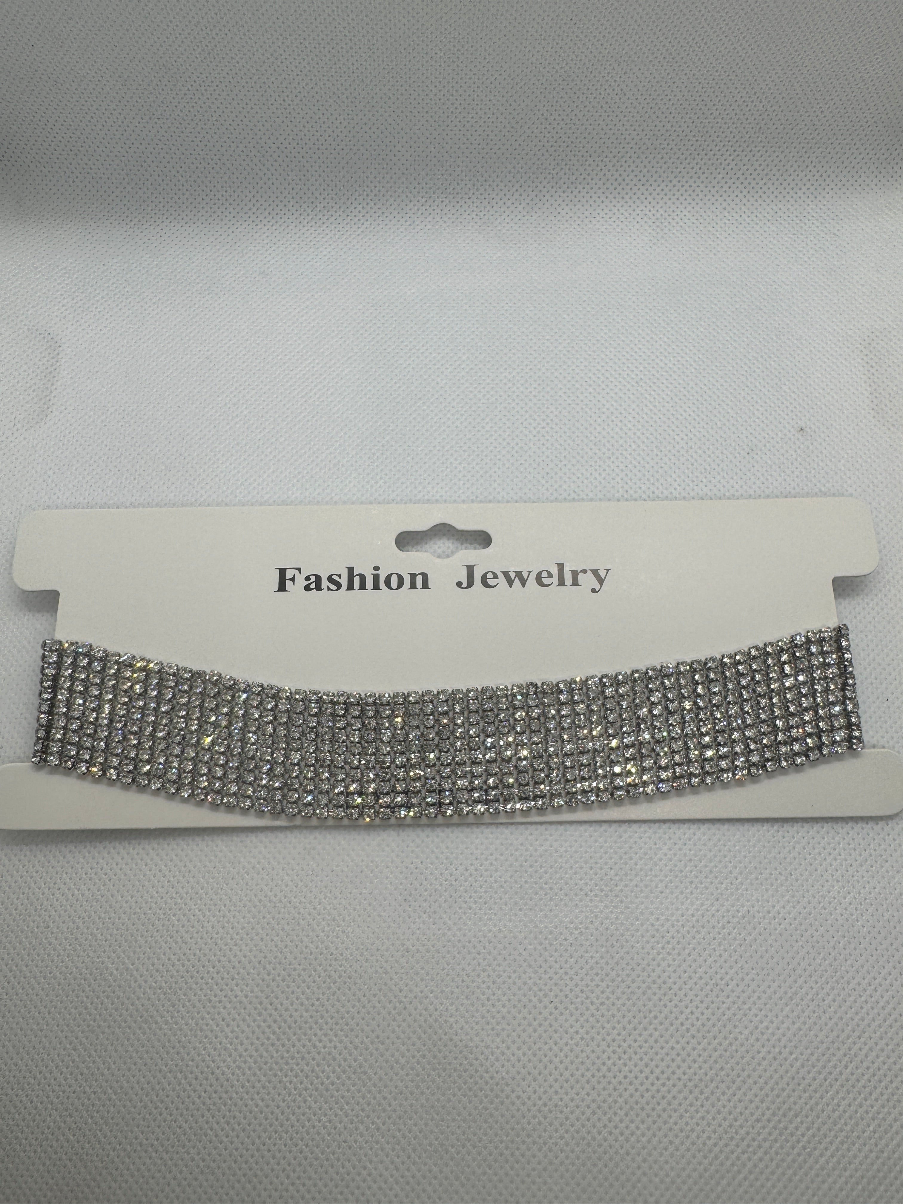 Girocollo fascia larga con micro brillantini argento